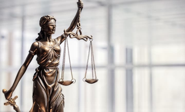 Lady Justice holding balanced scales
